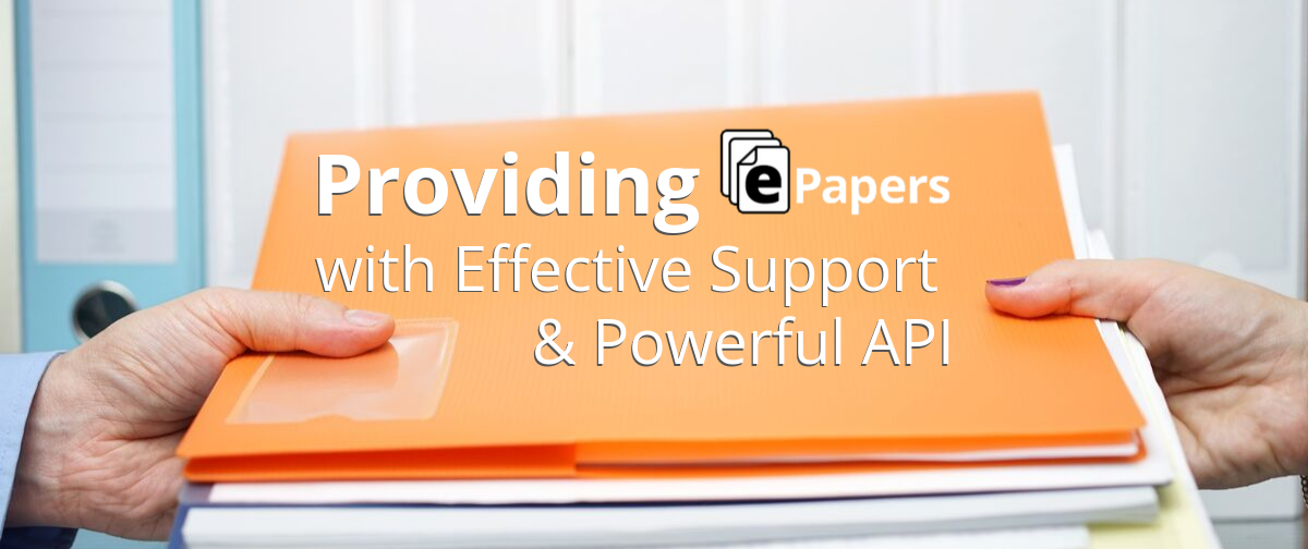 a male and female hand holding an orange folder with the text "Providing ePapers with effective support & powerful API"