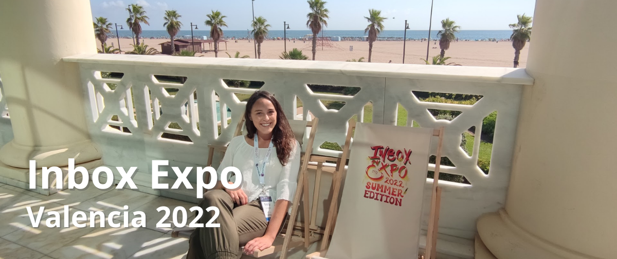 Emily sitting on the deckchairs at Inbox Expo 2022 in Valencia