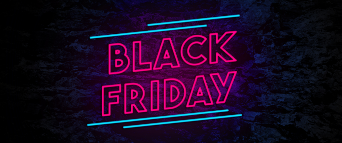 neon sign saying black friday on a black background