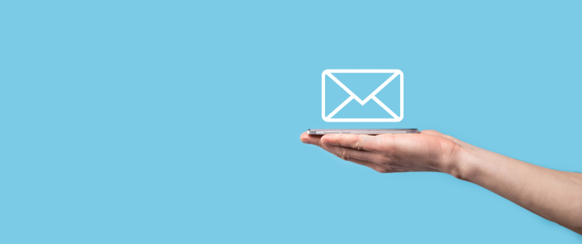 blue background with a hand holding an email icon